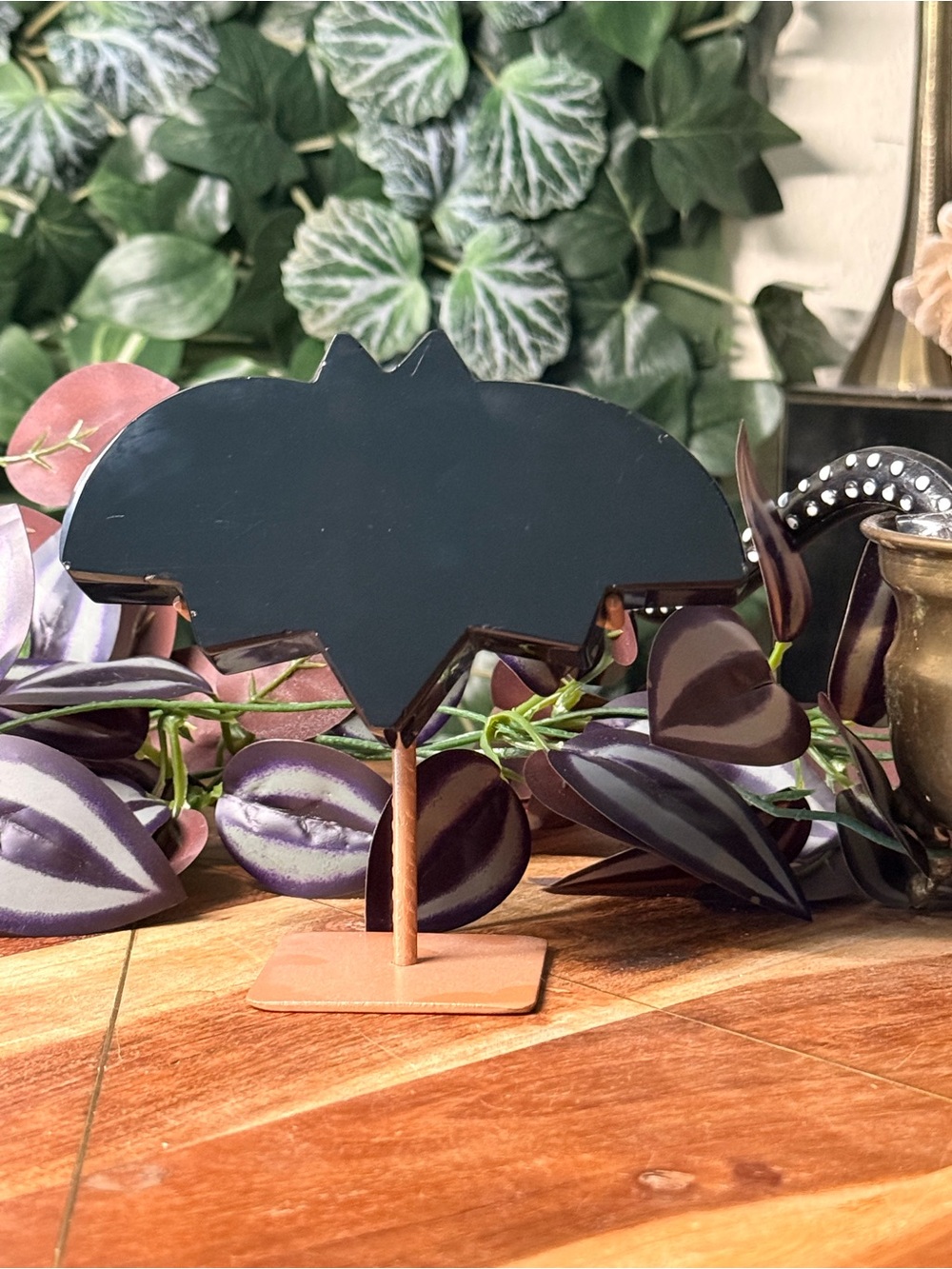 Black obsidian bat on stand